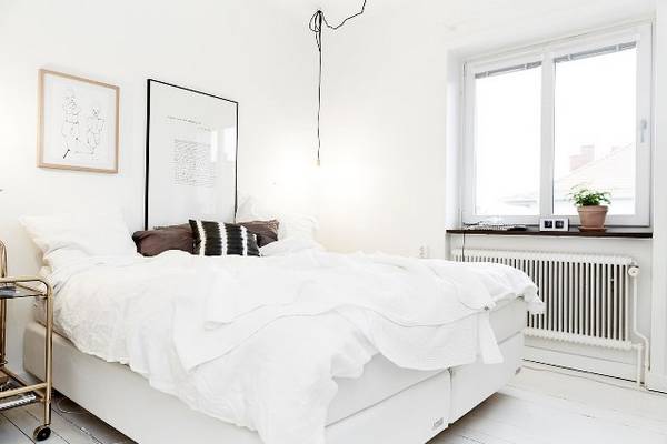 Использование в интерьере спальни скандинавского стиля - фото
